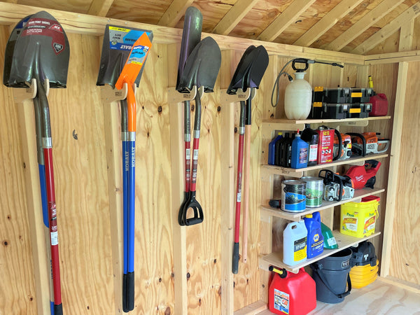 Yard tool rack and tool organizer. A shed with a shelf holding various tools and items, including a yard tool rack and garden tool rack. Kit also includes shelf brackets which are easy to install and look great.lf