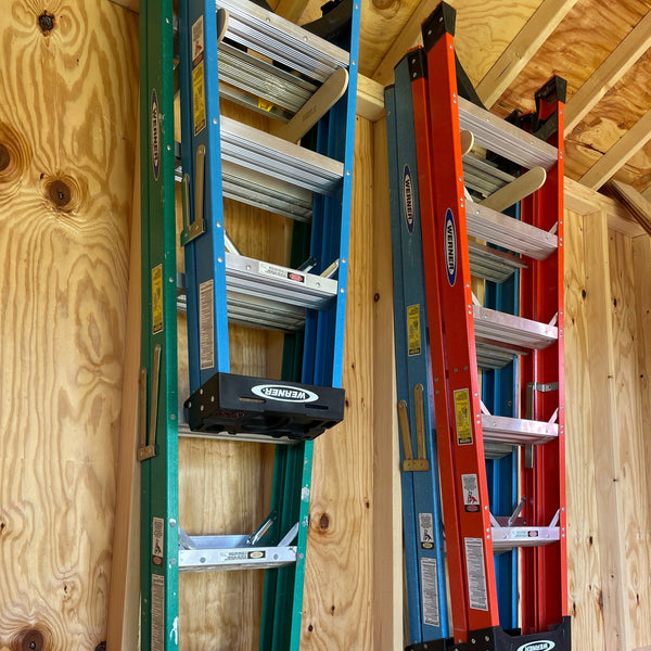Step ladder storage rack for storing ladders in sheds.