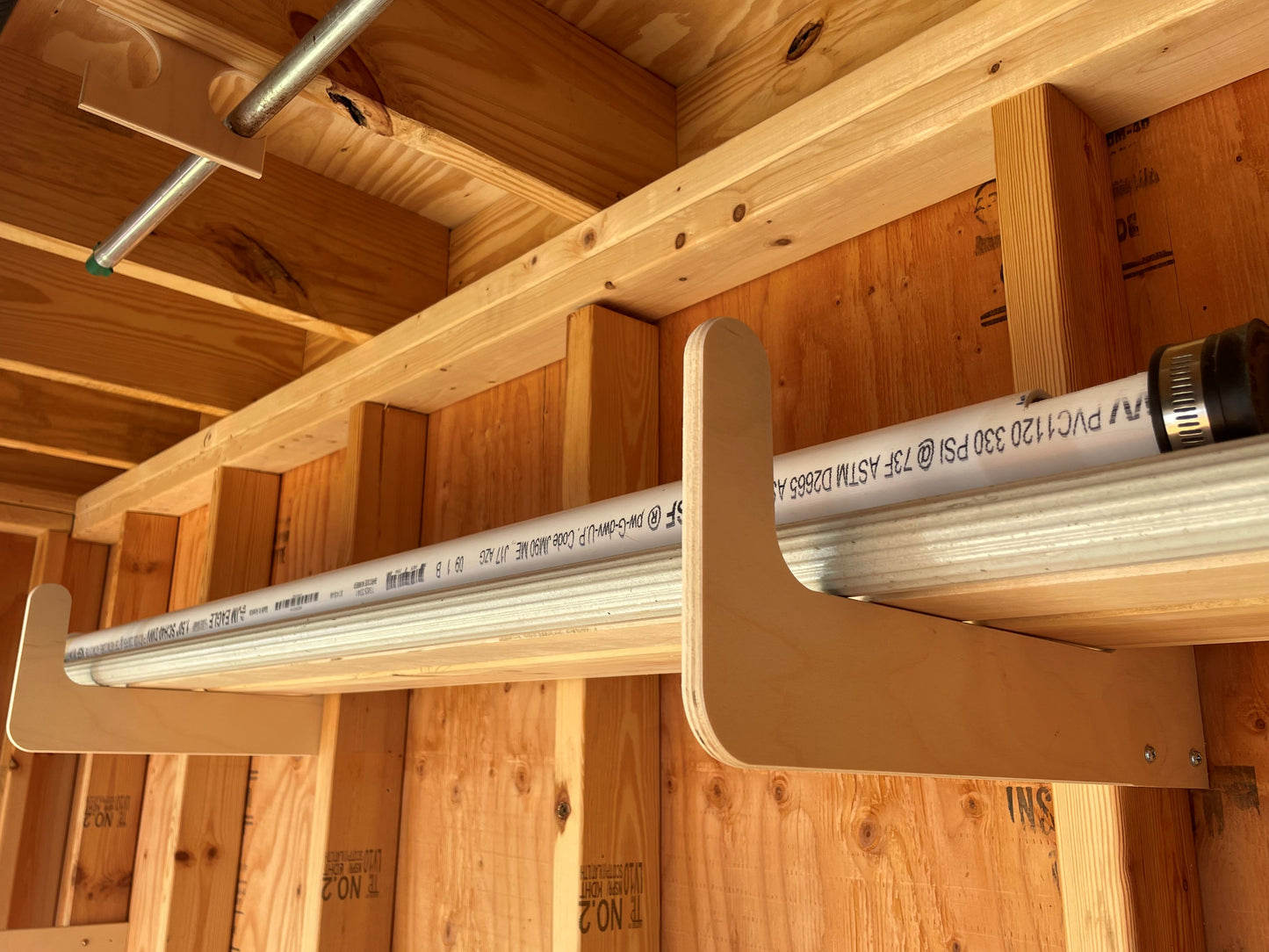 The storage organizer allows you to organize pipe, wood and long items that are stored in sheds.