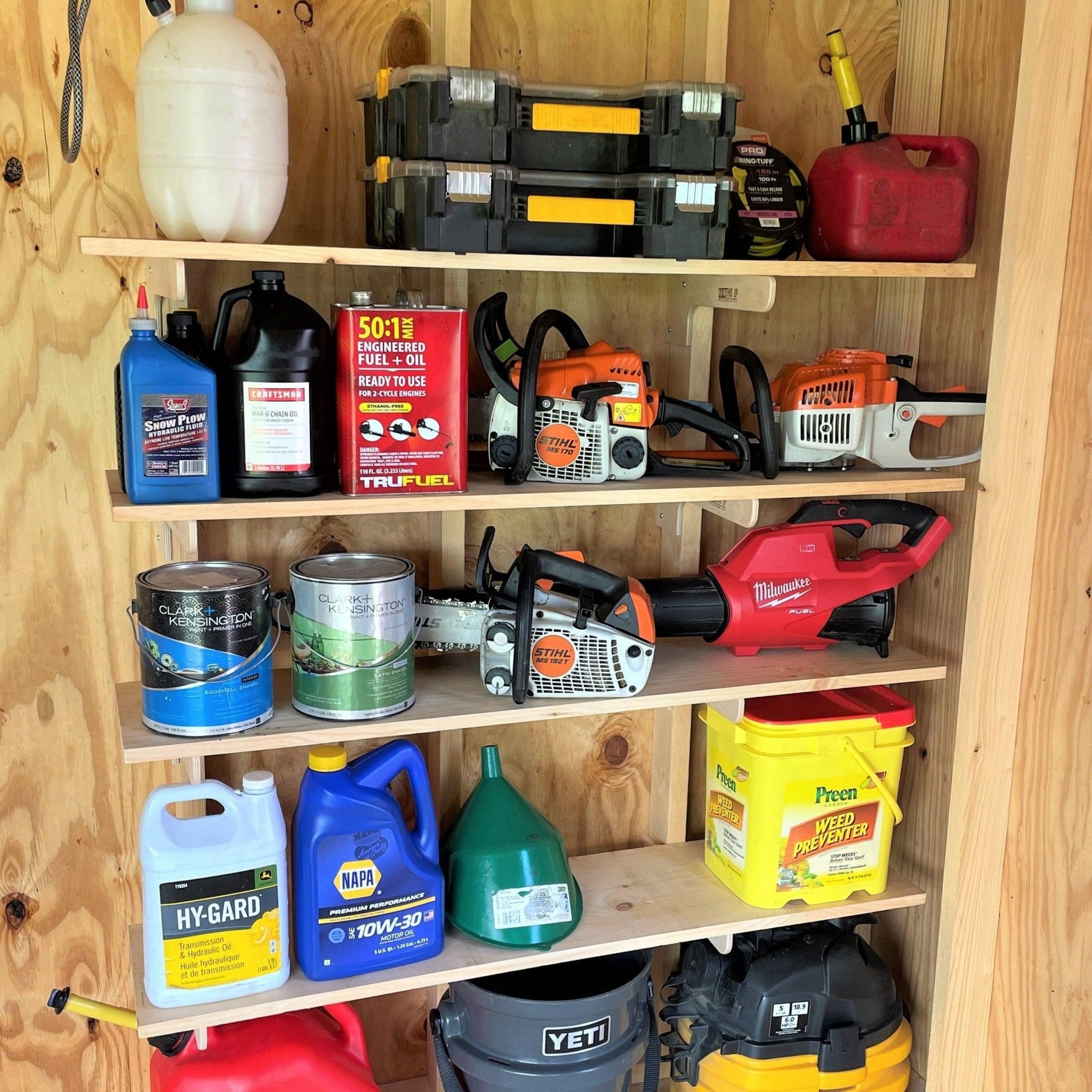 Deluxe Shed Kit for outdoor storage, featuring yard tool racks and garden tool storage solutions.