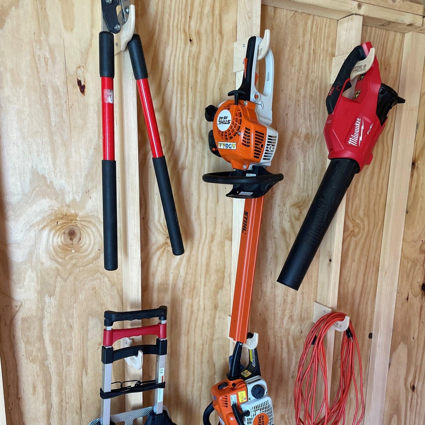 Shed accessories and garden tool racks in one complete Deluxe Shed Organizer Kit.