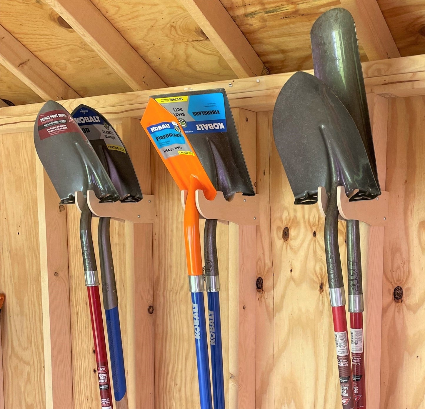 Shovels organized. Complete Shed Organization Kit by HangThis Up.