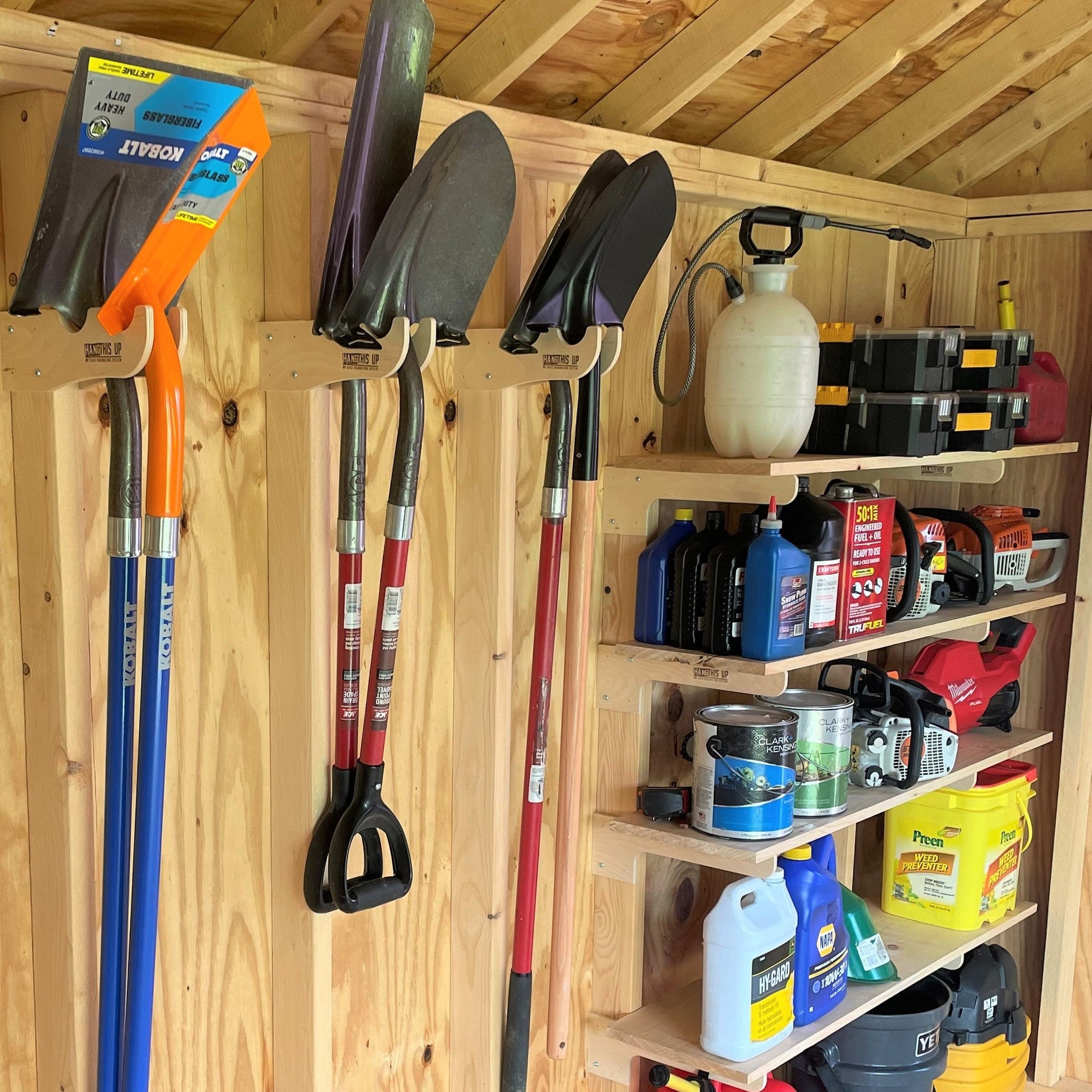 A neatly organized shed with a shelf holding tools and other items. Utilize shed organizer kit, shelf brackets, and yard tool hooks for efficient storage.