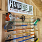 Yard tool rack for shed and garden tool storage, keeping tools organized and easily accessible.