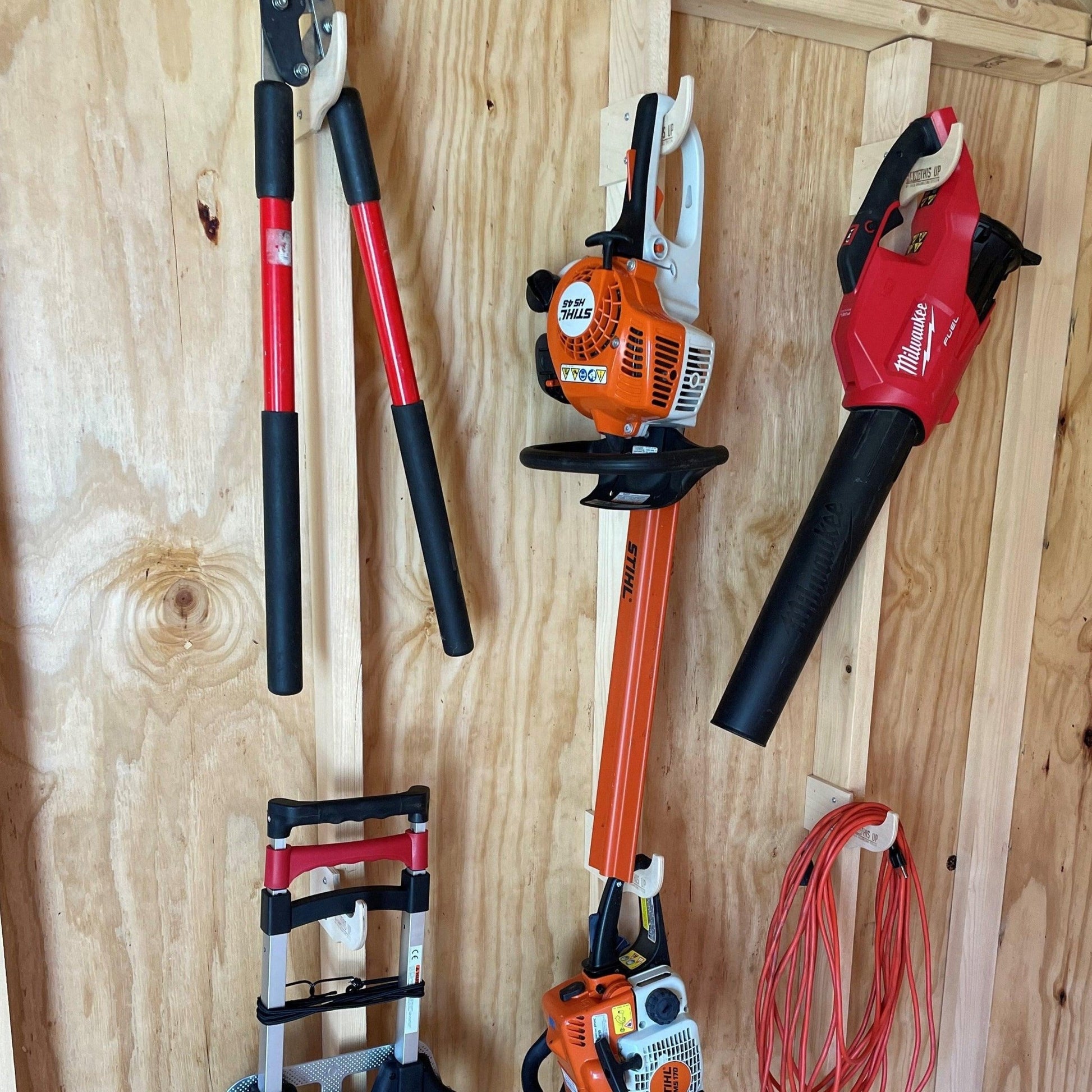Shed accessories and garden tool racks in one complete Deluxe Shed Organizer Kit.