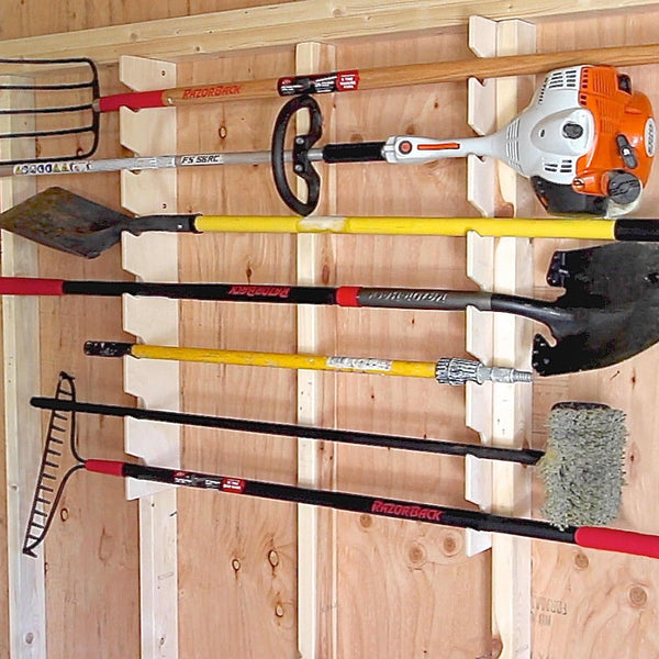Organize your shed with this wall mounted tool rack, ideal for storing garden tools and yard equipment
