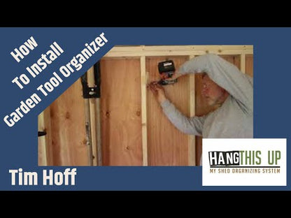A neatly organized shed with a shelf holding tools and other items. Utilize shed organizer kit, shelf brackets, and yard tool hooks for efficient storage.